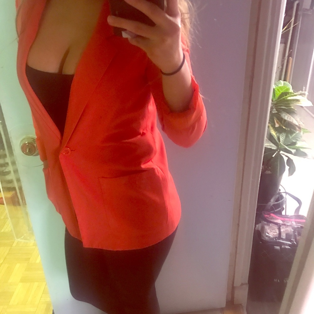An orange oversized small blazer from forever 21